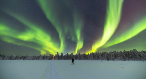 Chasse aux aurores boréales en raquettes