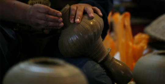 Participation à une démonstration de poterie local