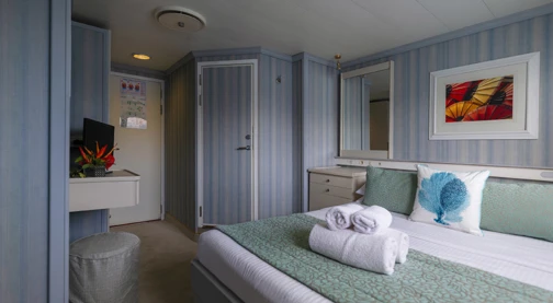 Cat. A: Cubierta principal y superior. Cama doble o gemelas