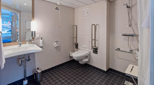 Cabine extérieure accessible aux fauteuils roulants