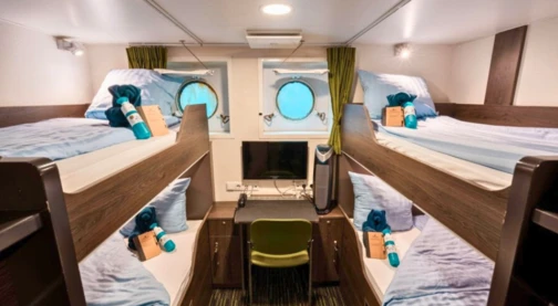 Camarote cuádruple con ojo de buey