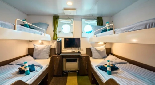 Camarote cuádruple con ojo de buey