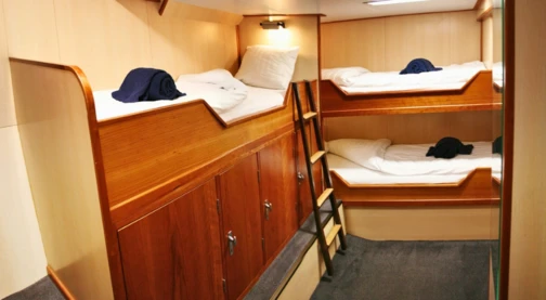 Cabine triple avec hublot