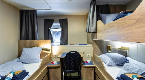 Cabine triple avec hublot